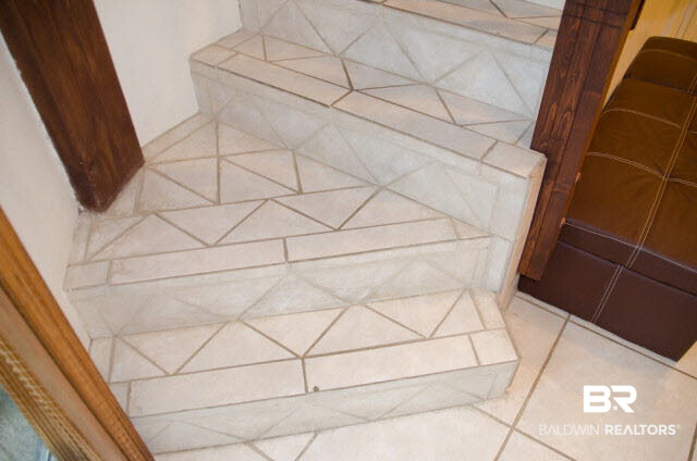 5751 Alabama Street Orange Beach, AL 36561 - Photo 23 of 25 Tile Floor in Living Area and Stairs