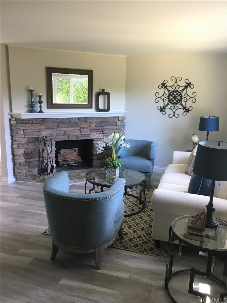 Living room with stone fireplace