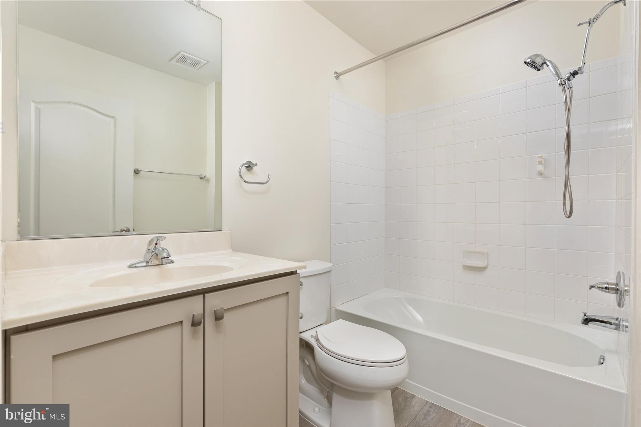 250 Stager Avenue Falling Waters, WV 25419 - Photo 17 of 31 a bathroom with a sink a toilet and shower