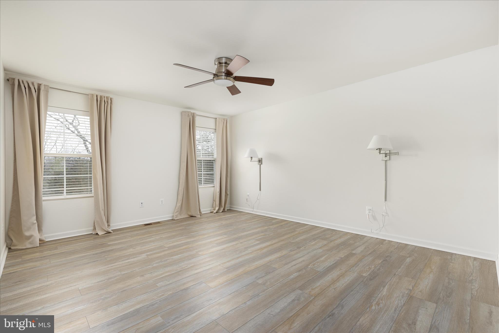250 Stager Avenue Falling Waters, WV 25419 - Photo 19 of 31 an empty room with wooden floor closet and windows