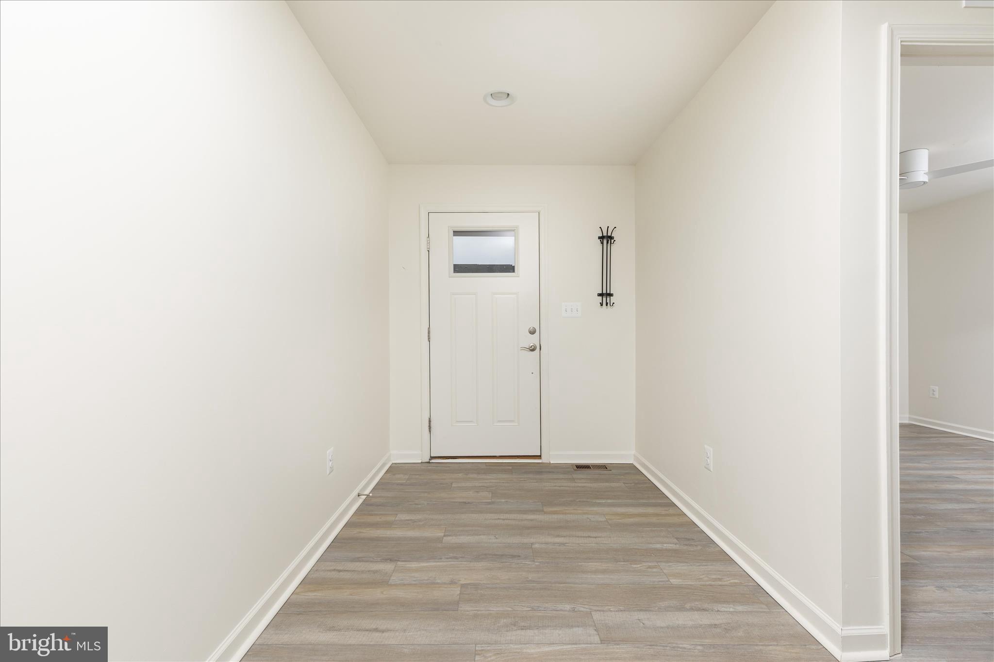 250 Stager Avenue Falling Waters, WV 25419 - Photo 3 of 31 a view of a room with wooden floor