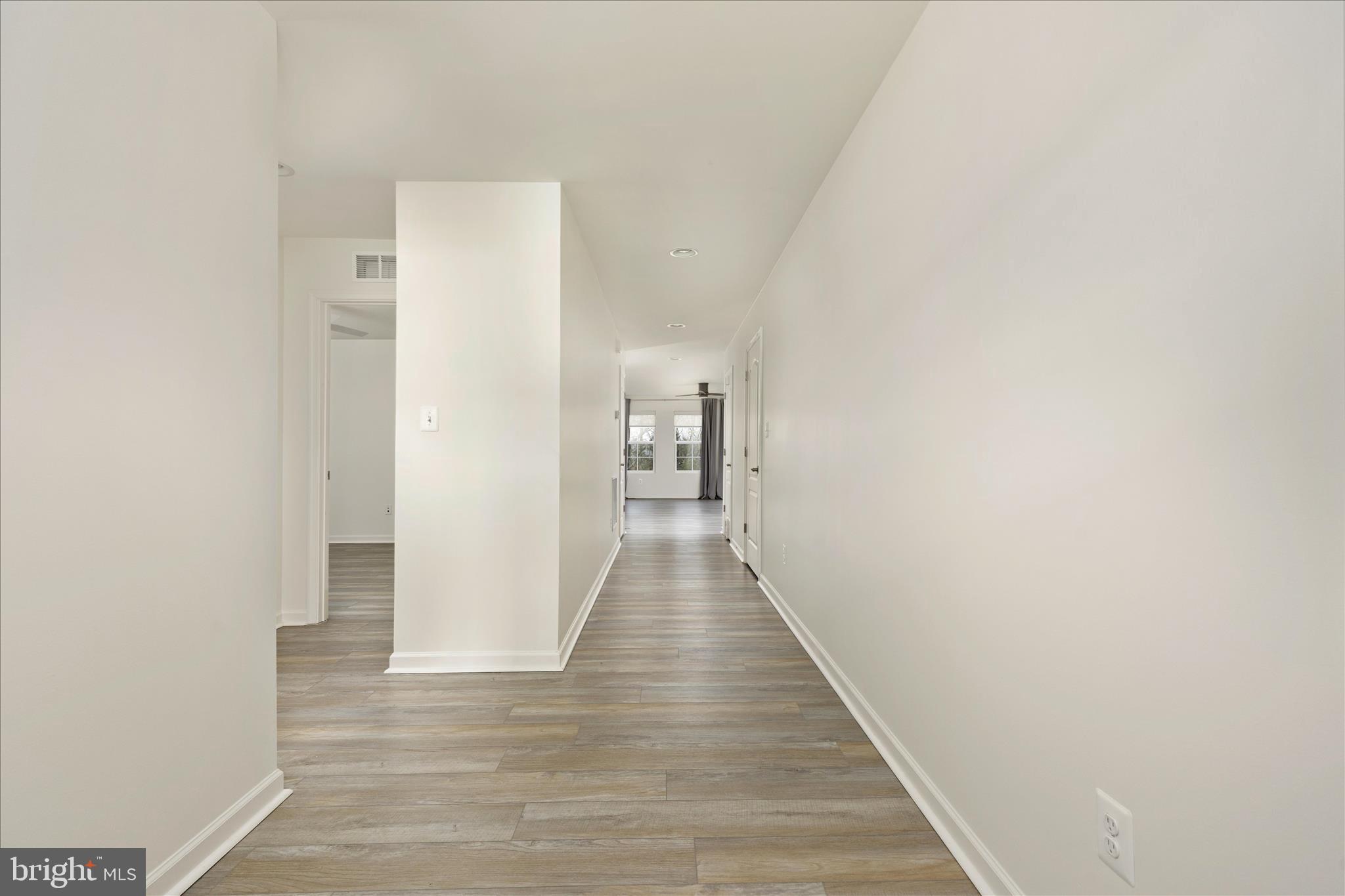 250 Stager Avenue Falling Waters, WV 25419 - Photo 4 of 31 a view of a hallway with wooden floor