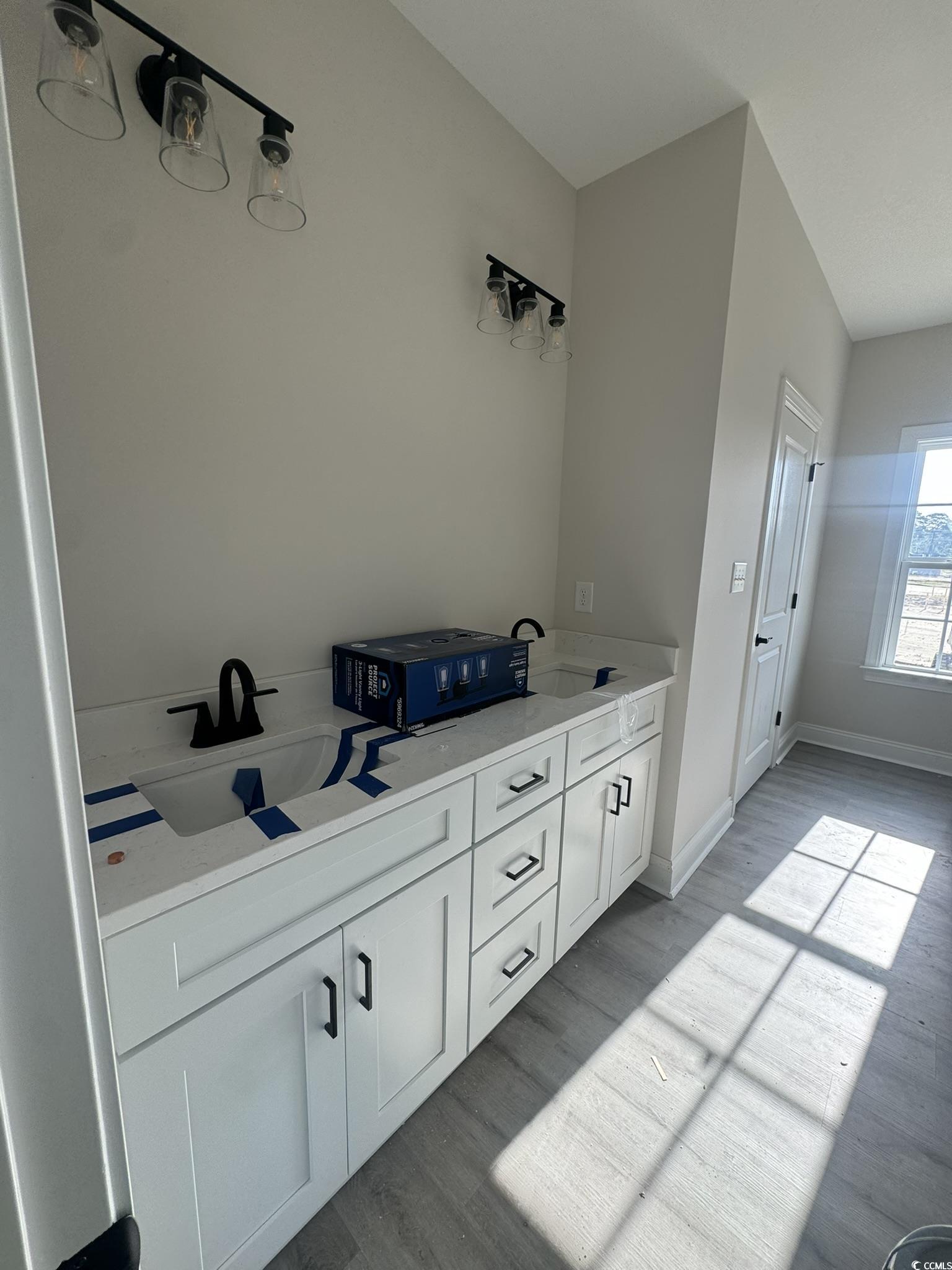 334 William Nobles Road Aynor, SC 29511 - Photo 17 of 38 Bathroom featuring wood finished floors and double vanity