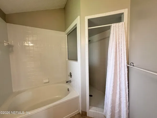 a bathroom with a bathtub