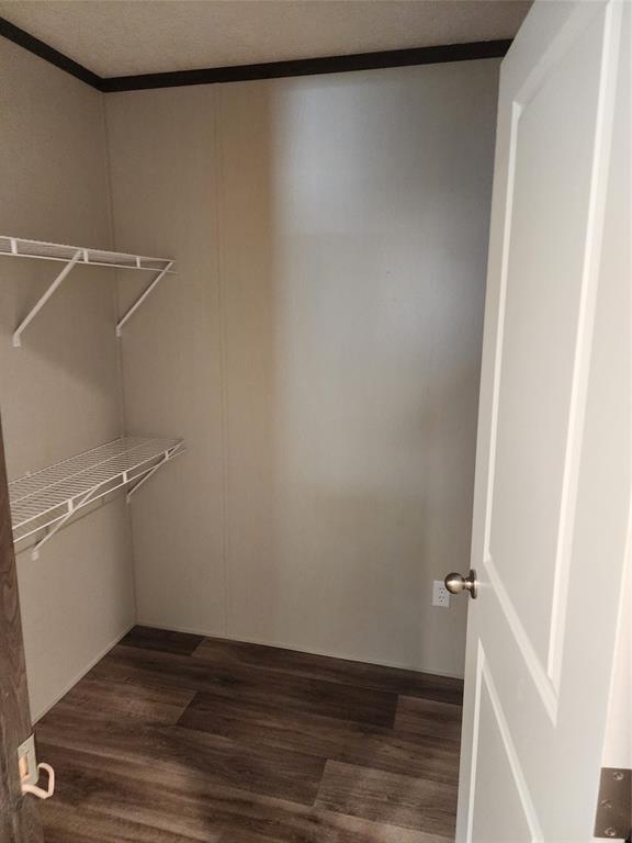 229 Maple Street Mabank, TX 75156 - Photo 25 of 25 a view of a room with wooden floor