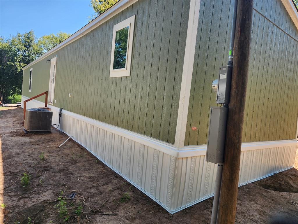 229 Maple Street Mabank, TX 75156 - Photo 7 of 25 a view of a porch