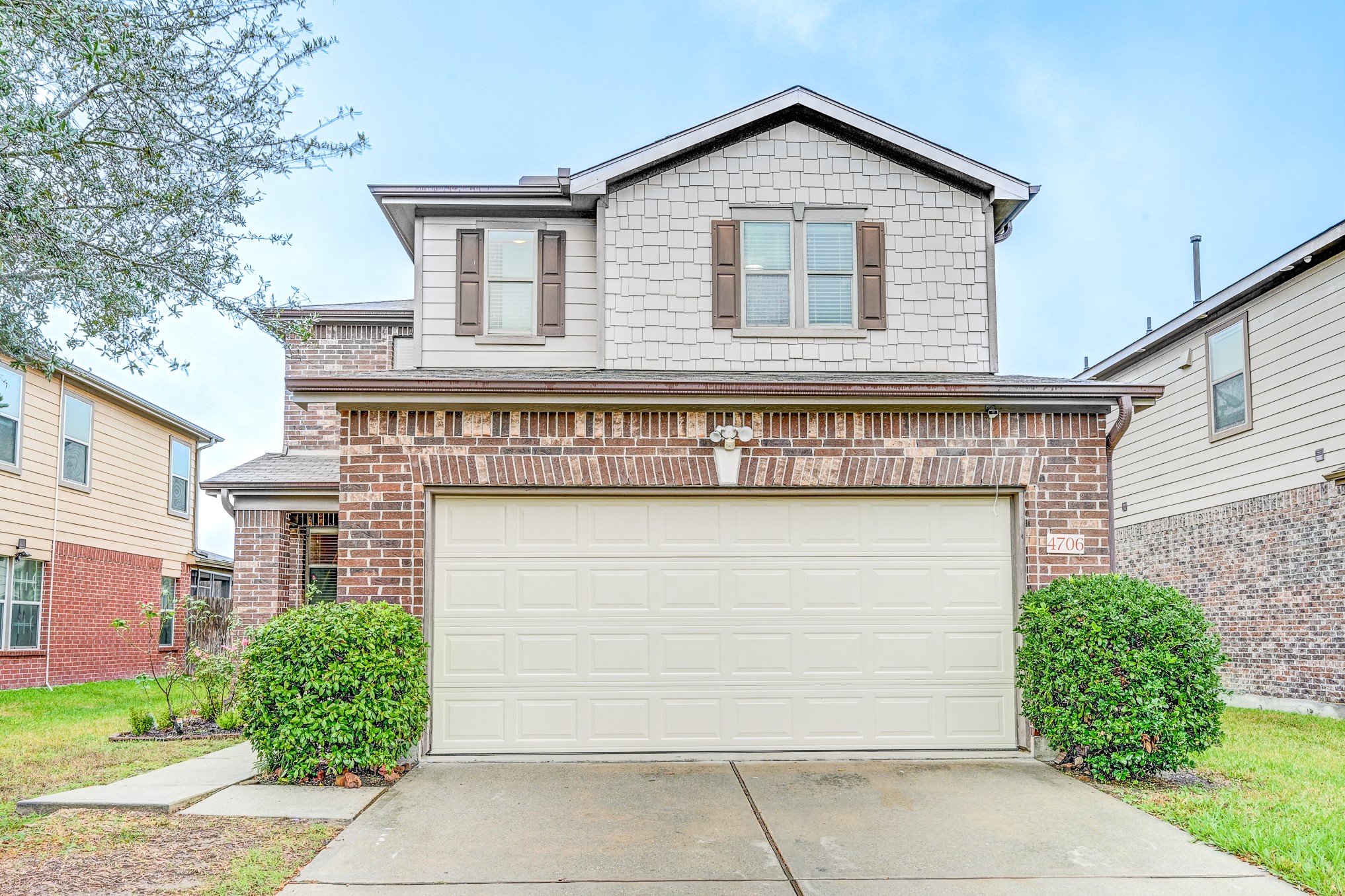 a view of a house with garage