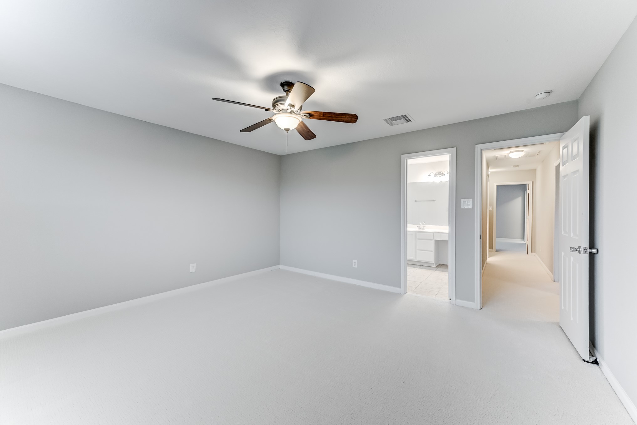 4706 Mint Trail Houston, TX 77066 - Photo 27 of 46 a view of an empty room with a bathroom