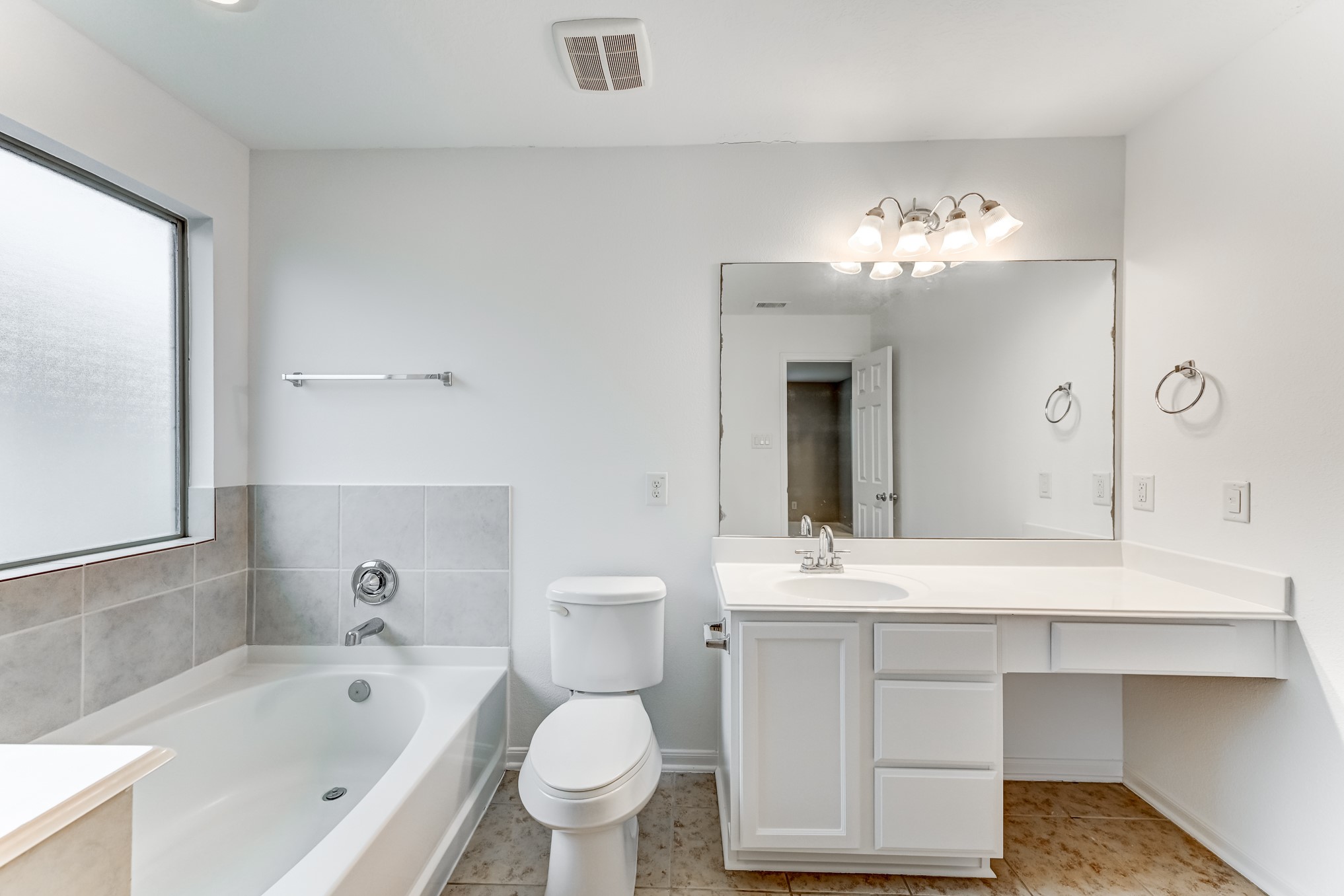 4706 Mint Trail Houston, TX 77066 - Photo 28 of 46 a bathroom with a sink a toilet and bathtub
