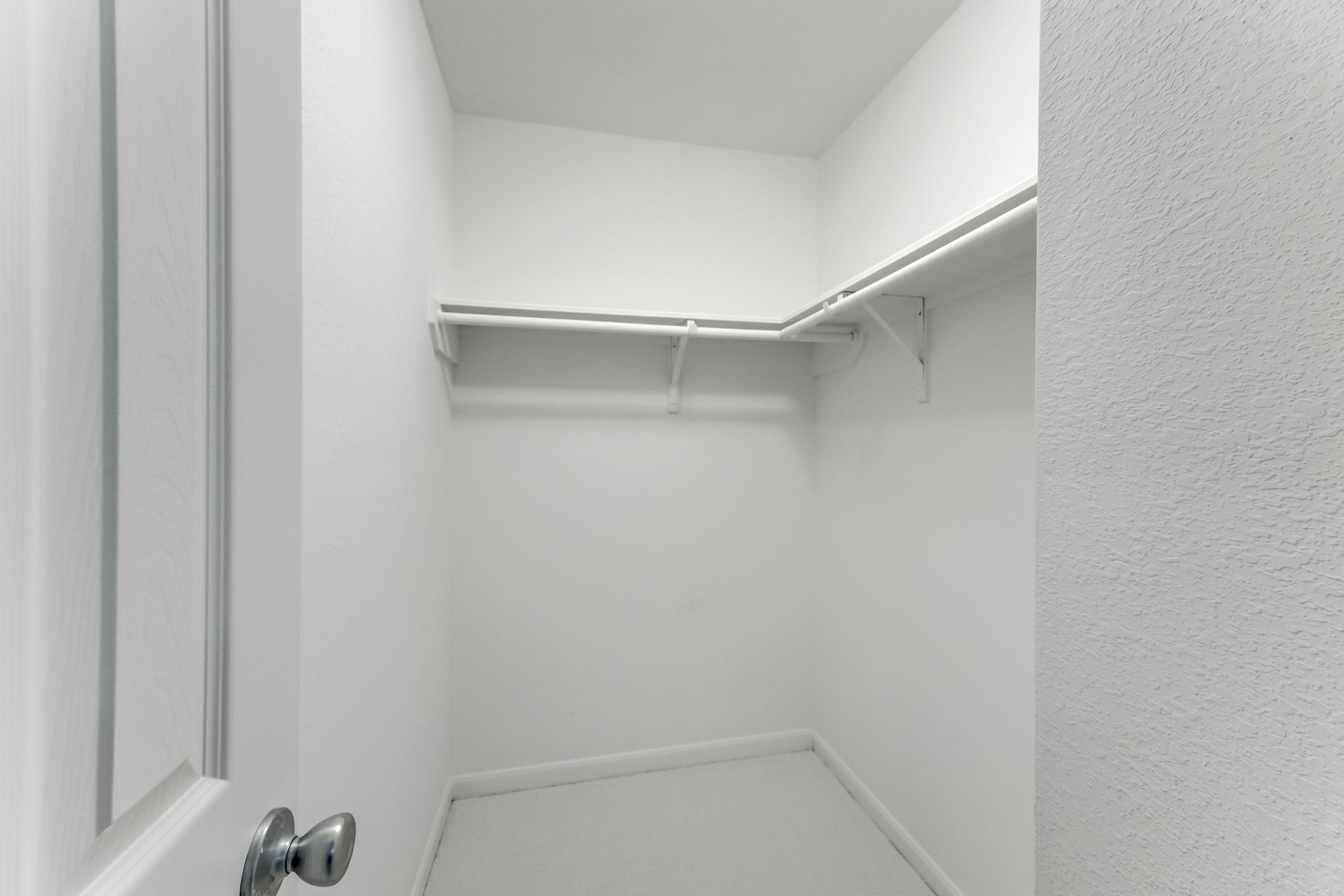 4706 Mint Trail Houston, TX 77066 - Photo 33 of 46 a view of an empty walk in closet