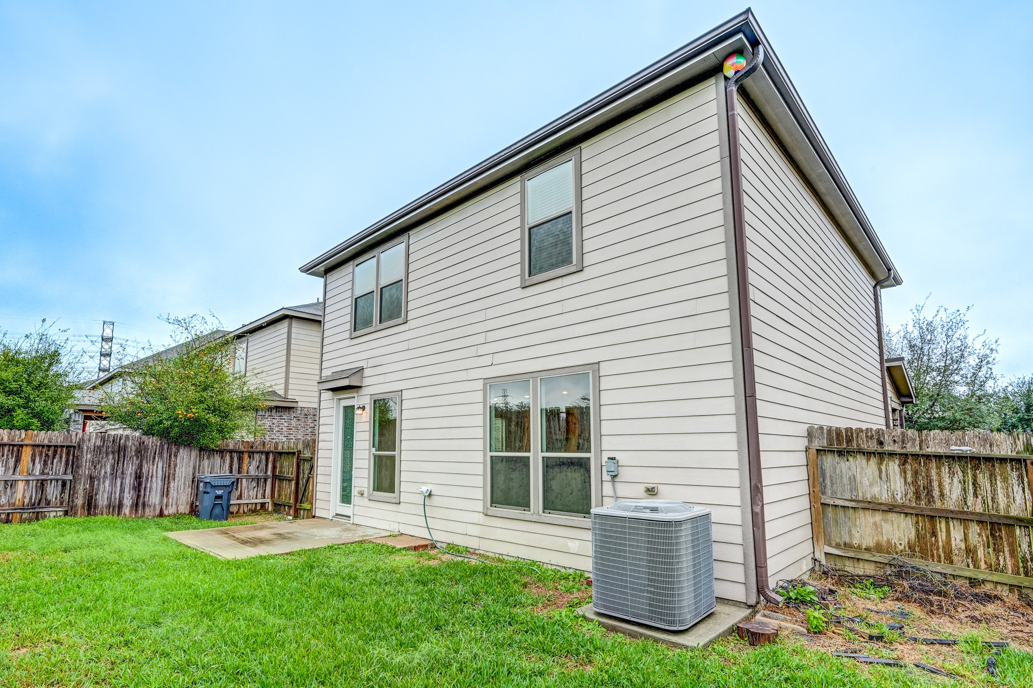 4706 Mint Trail Houston, TX 77066 - Photo 45 of 46 a backyard of a house with table and chairs