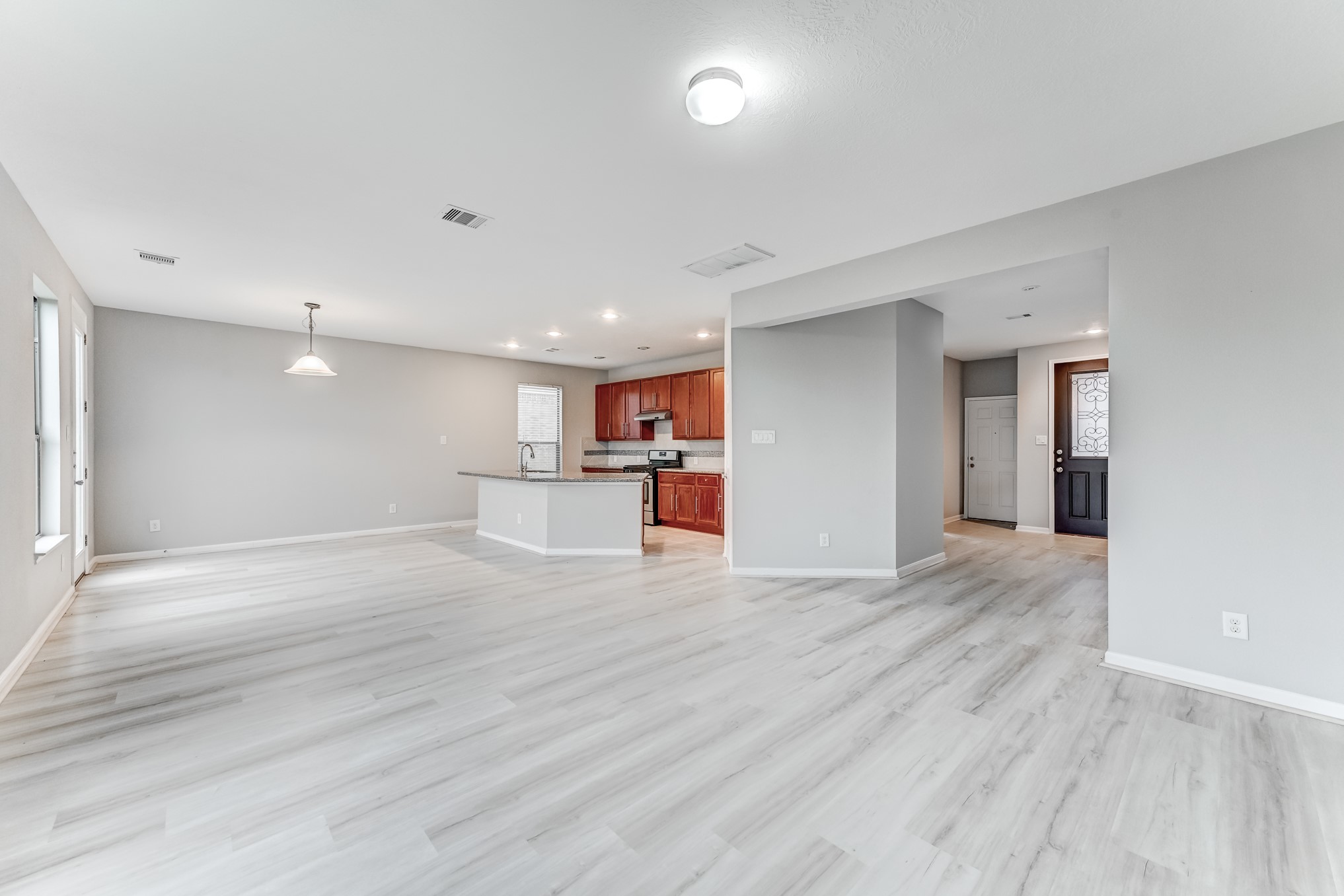 4706 Mint Trail Houston, TX 77066 - Photo 9 of 46 a view of a kitchen with a sink and a window