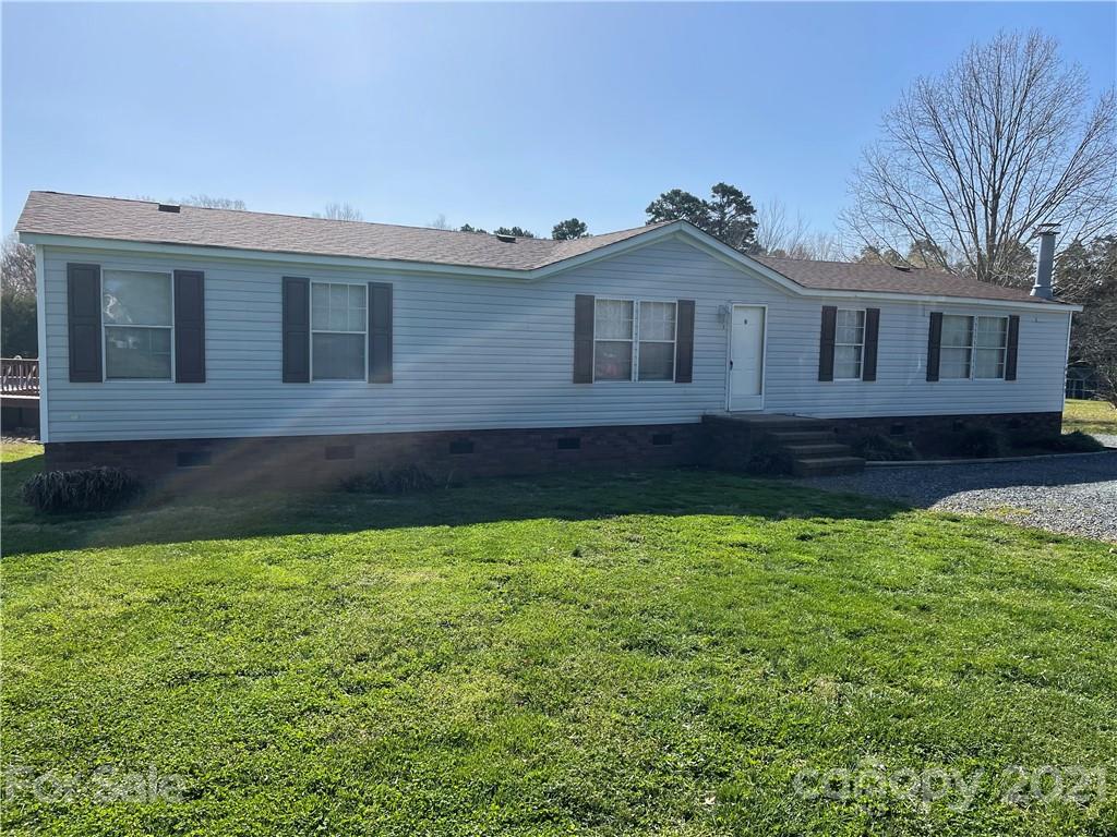 34908 Finger Road Mount Pleasant, NC 28124 - Photo 1 of 14 a house view with a garden space