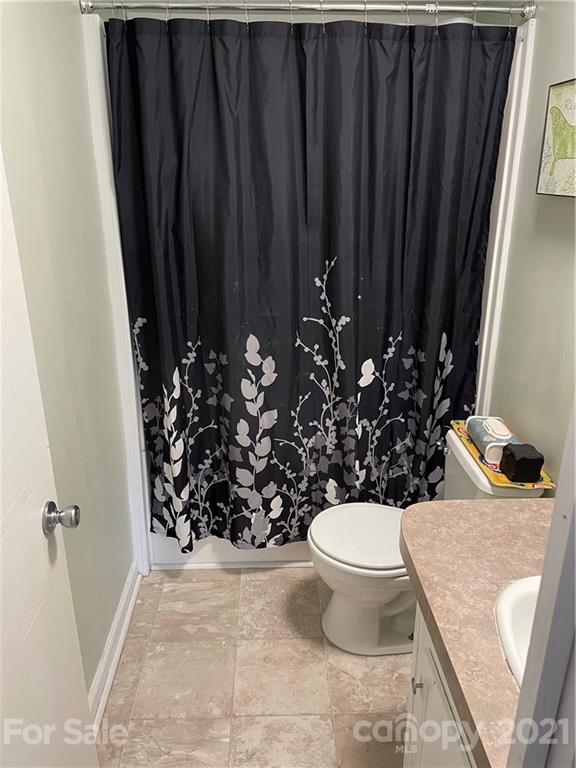 34908 Finger Road Mount Pleasant, NC 28124 - Photo 4 of 14 a bathroom with a toilet and a shower