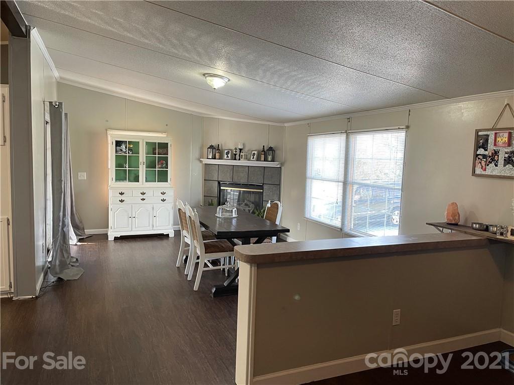 34908 Finger Road Mount Pleasant, NC 28124 - Photo 10 of 14 a view of a workspace with furniture and a window