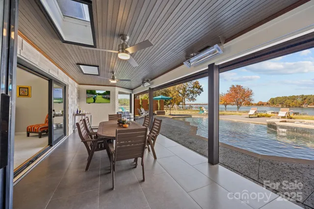a view of a patio with a table chairs and a patio