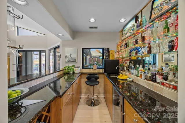 a view of a living room and balcony