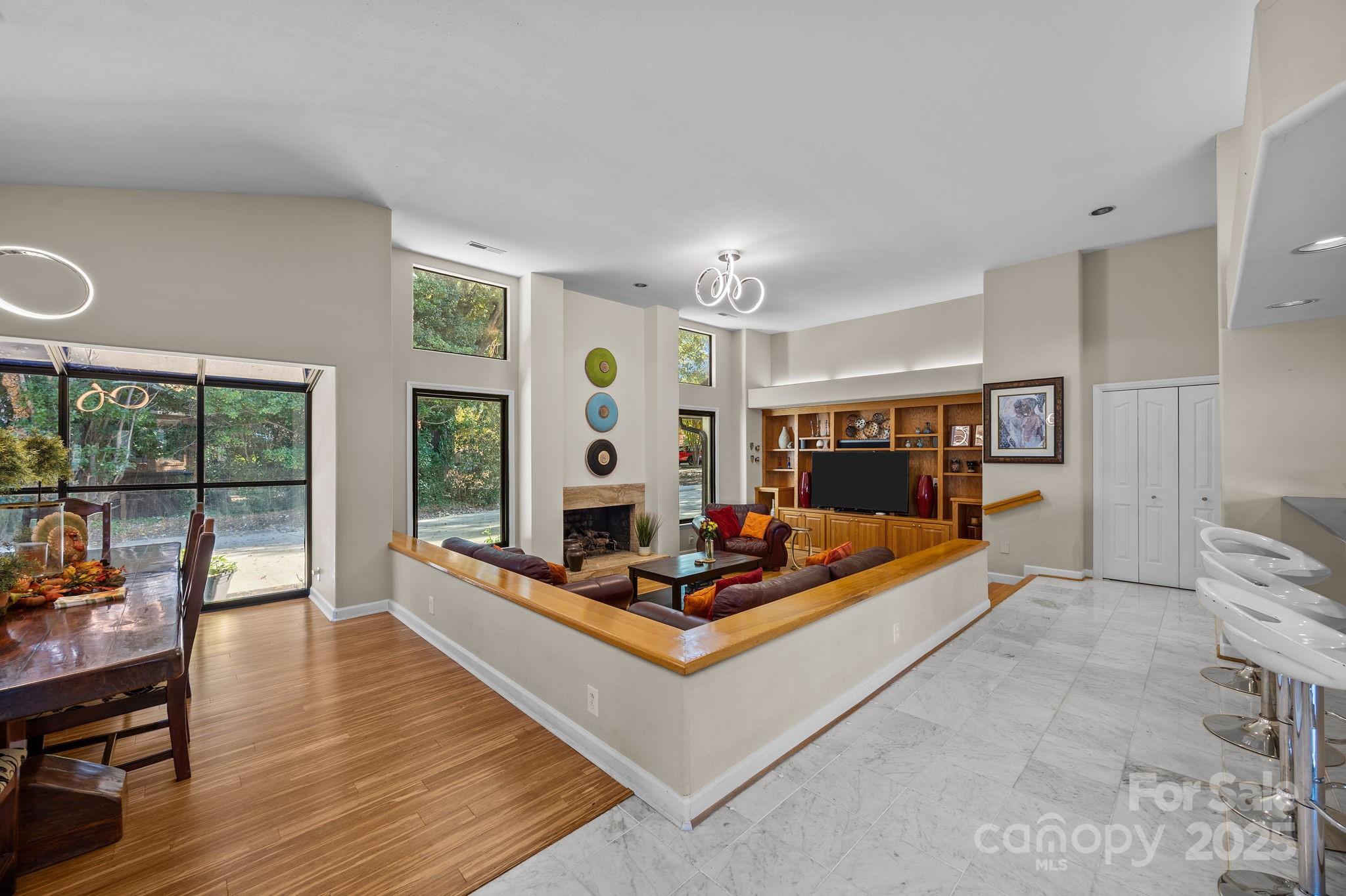 21400 Bethel Church Road Cornelius, NC 28031 - Photo 15 of 47 a living room with furniture pool table and a large window