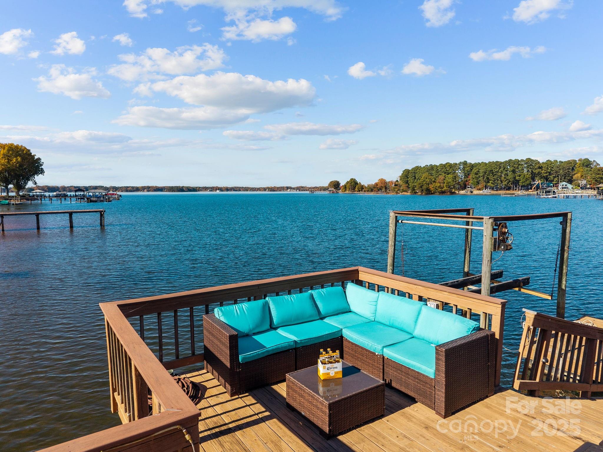 21400 Bethel Church Road Cornelius, NC 28031 - Photo 2 of 47 a view of a roof deck with couches