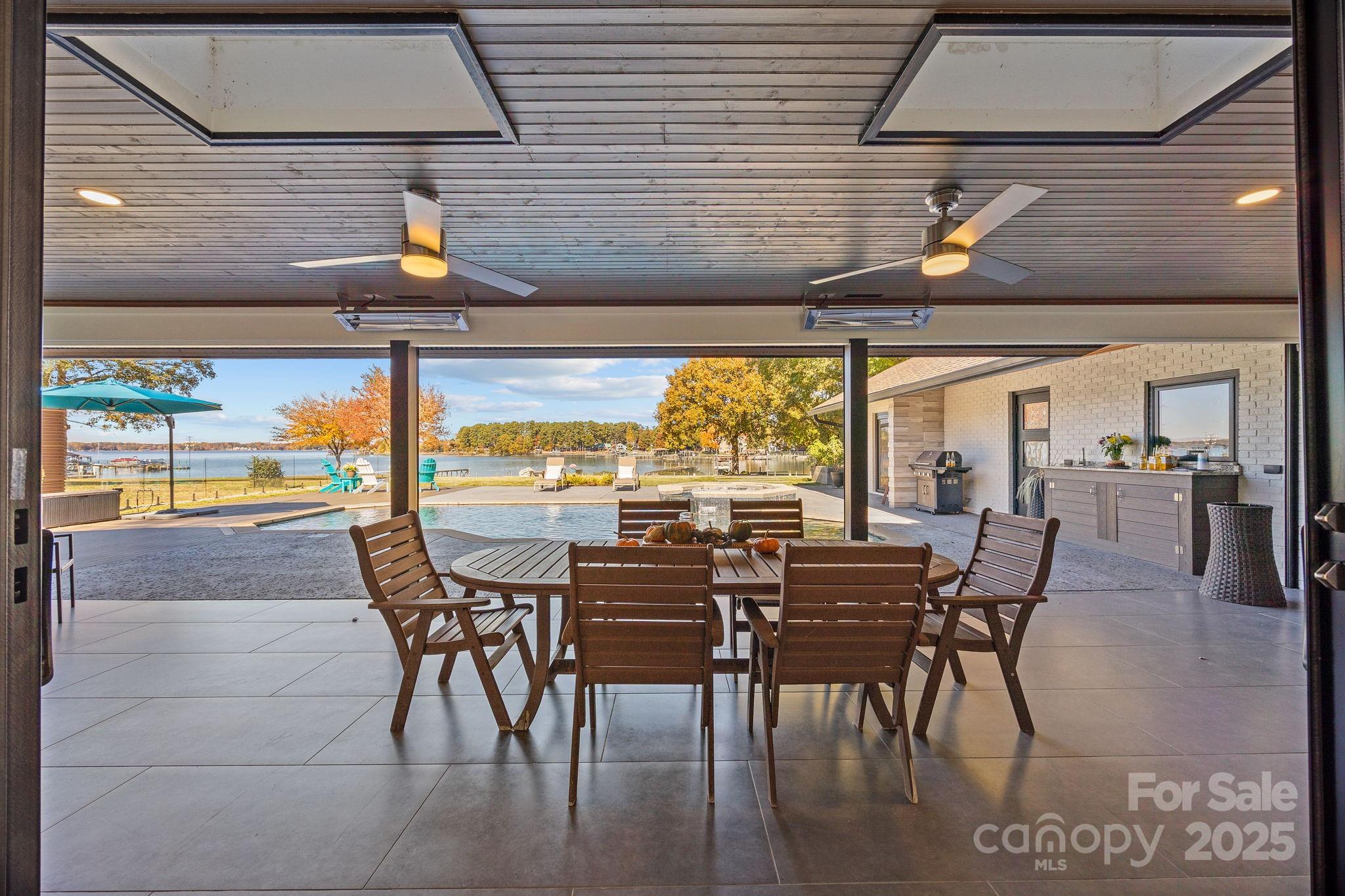 21400 Bethel Church Road Cornelius, NC 28031 - Photo 21 of 47 a view of a dining room with furniture and window