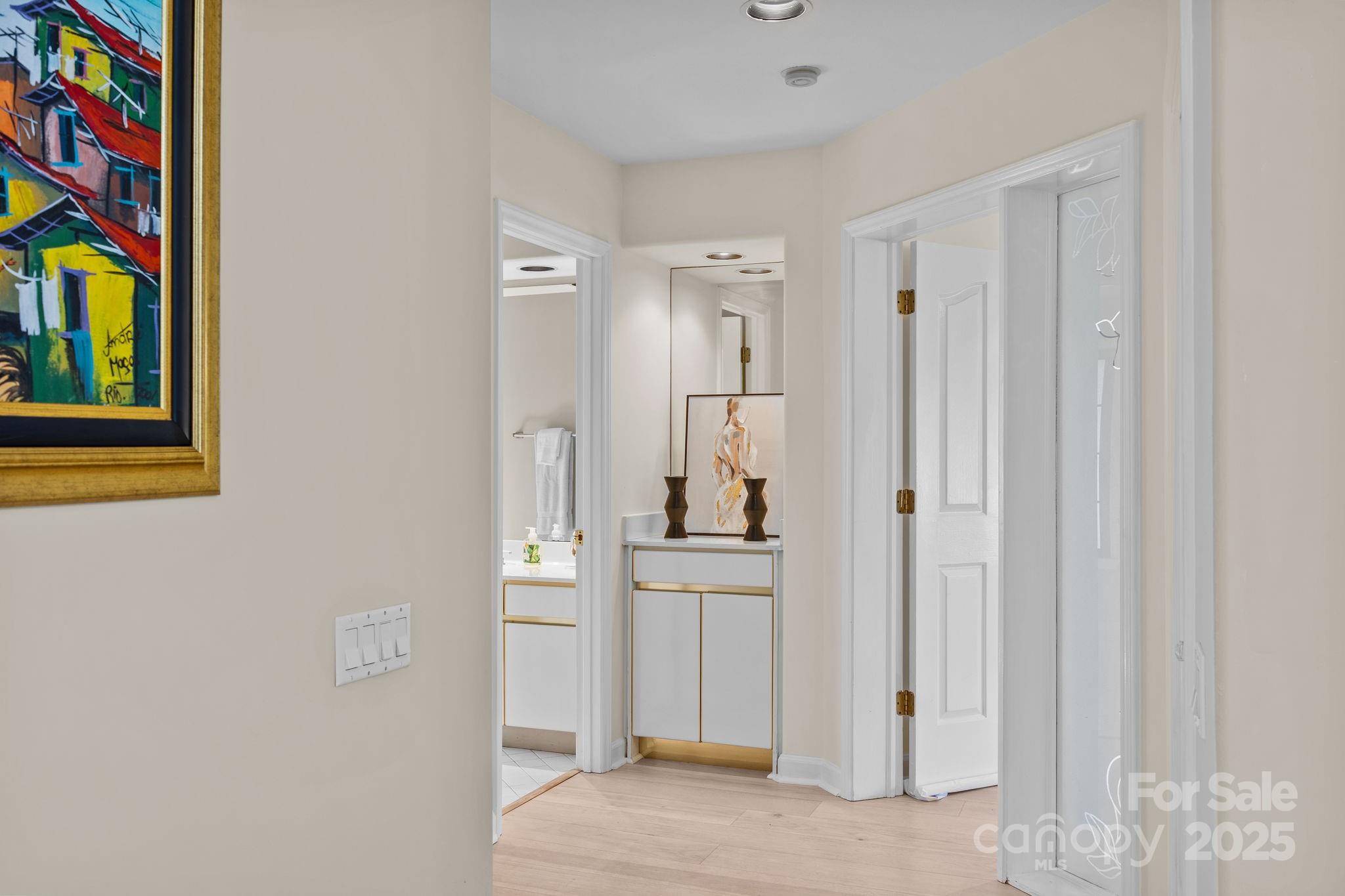 21400 Bethel Church Road Cornelius, NC 28031 - Photo 23 of 47 a view of a bedroom with wooden floor and cabinet