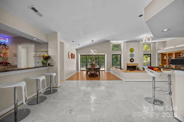 a lobby with furniture and a large window