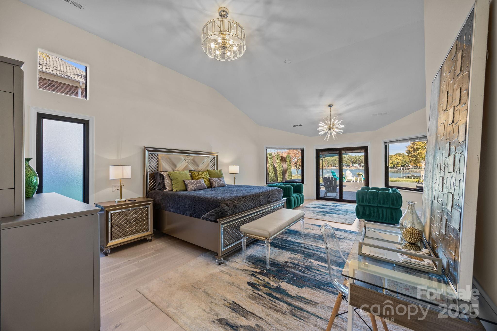21400 Bethel Church Road Cornelius, NC 28031 - Photo 27 of 47 a living room with a bed furniture and a large window