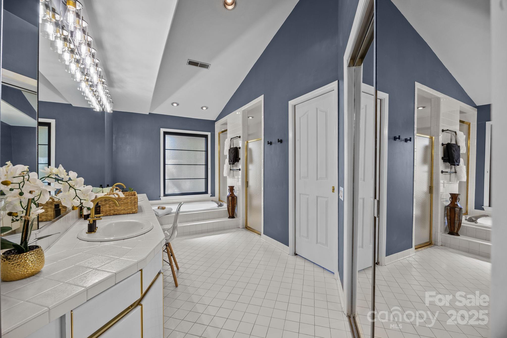 21400 Bethel Church Road Cornelius, NC 28031 - Photo 29 of 47 a dining room with furniture and chandelier