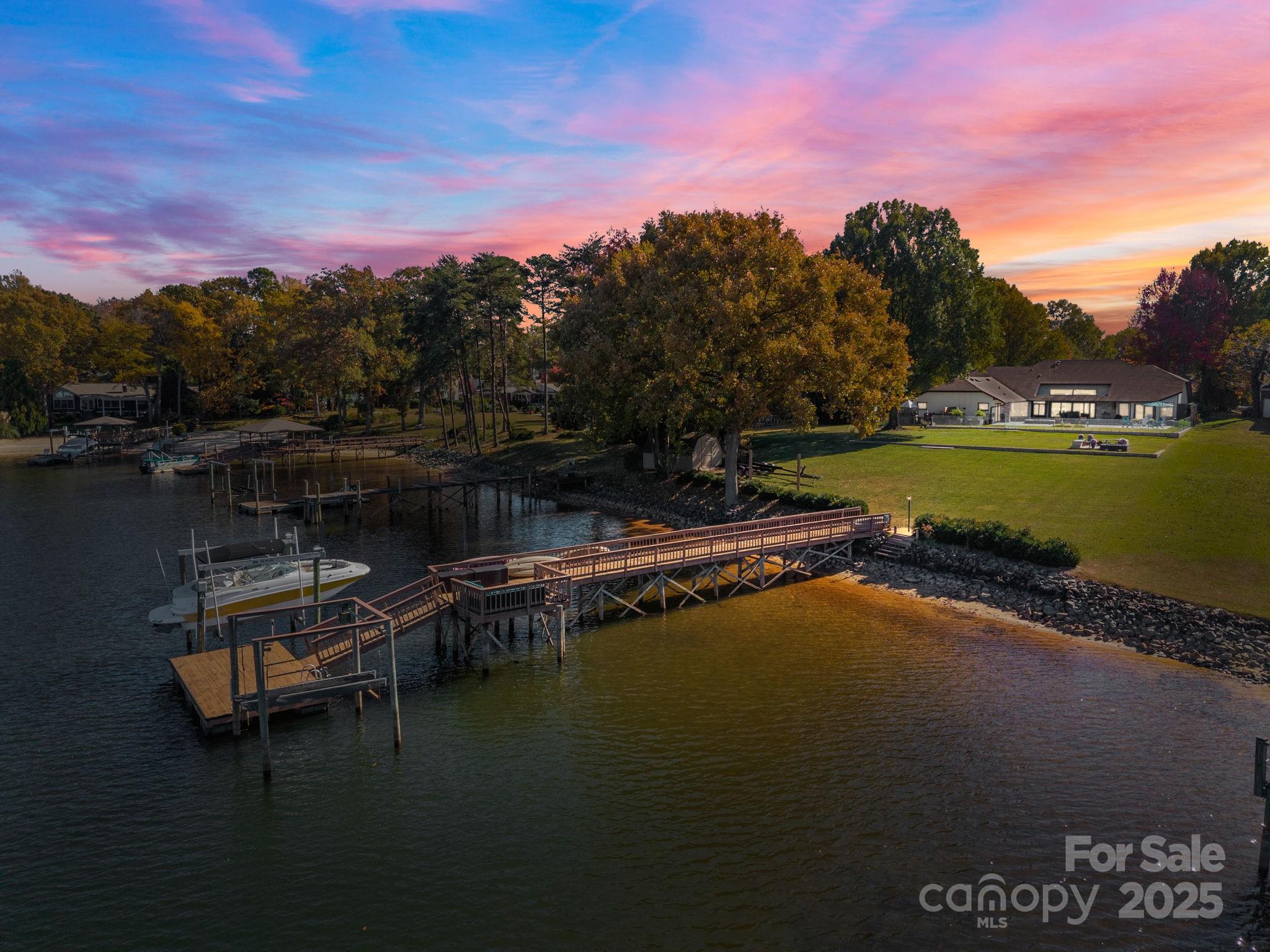 21400 Bethel Church Road Cornelius, NC 28031 - Photo 3 of 47 a view of a lake with a mountain