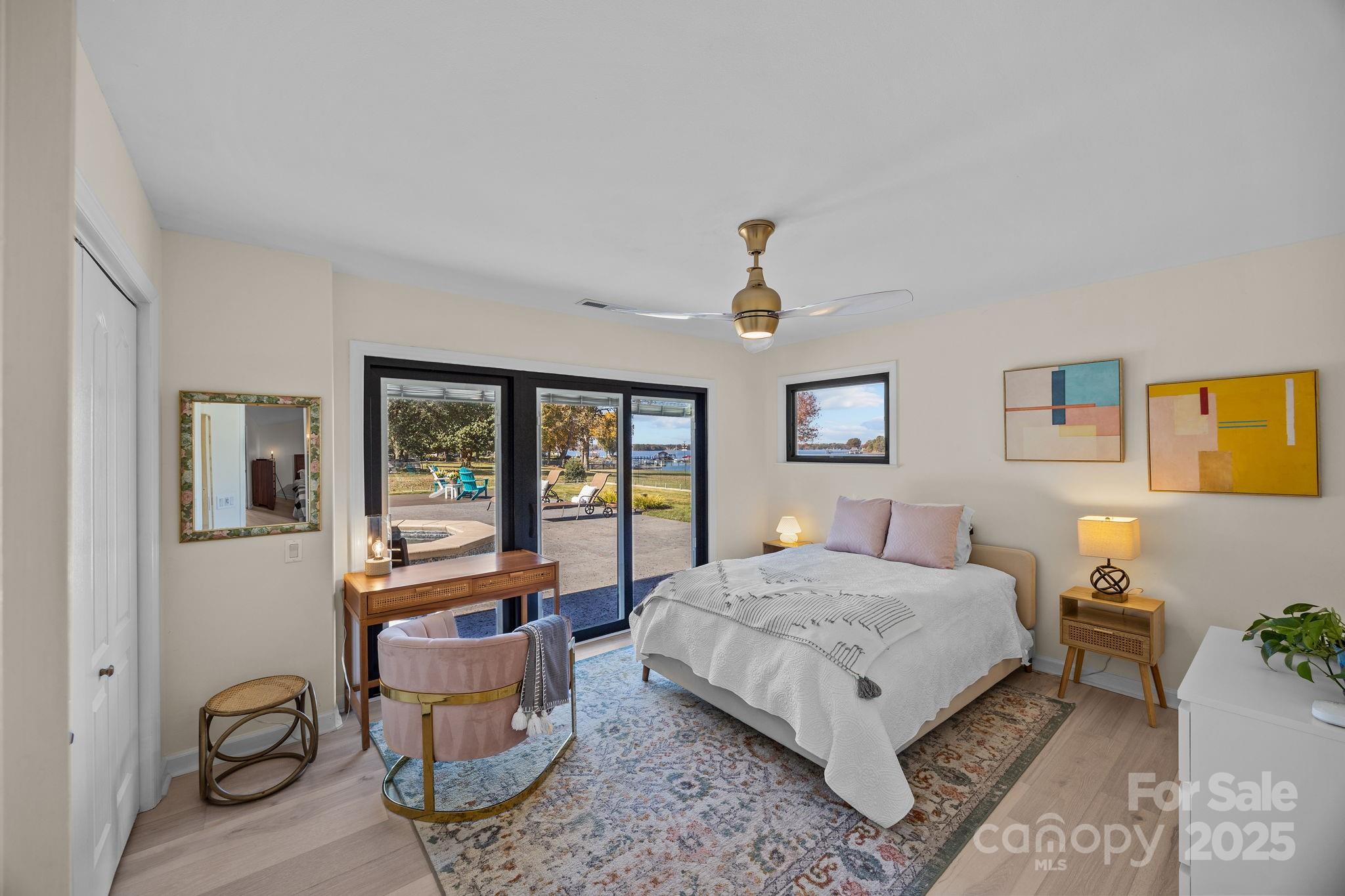 21400 Bethel Church Road Cornelius, NC 28031 - Photo 32 of 47 a living room with furniture and a large window