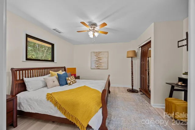 a bedroom with a bed and furniture