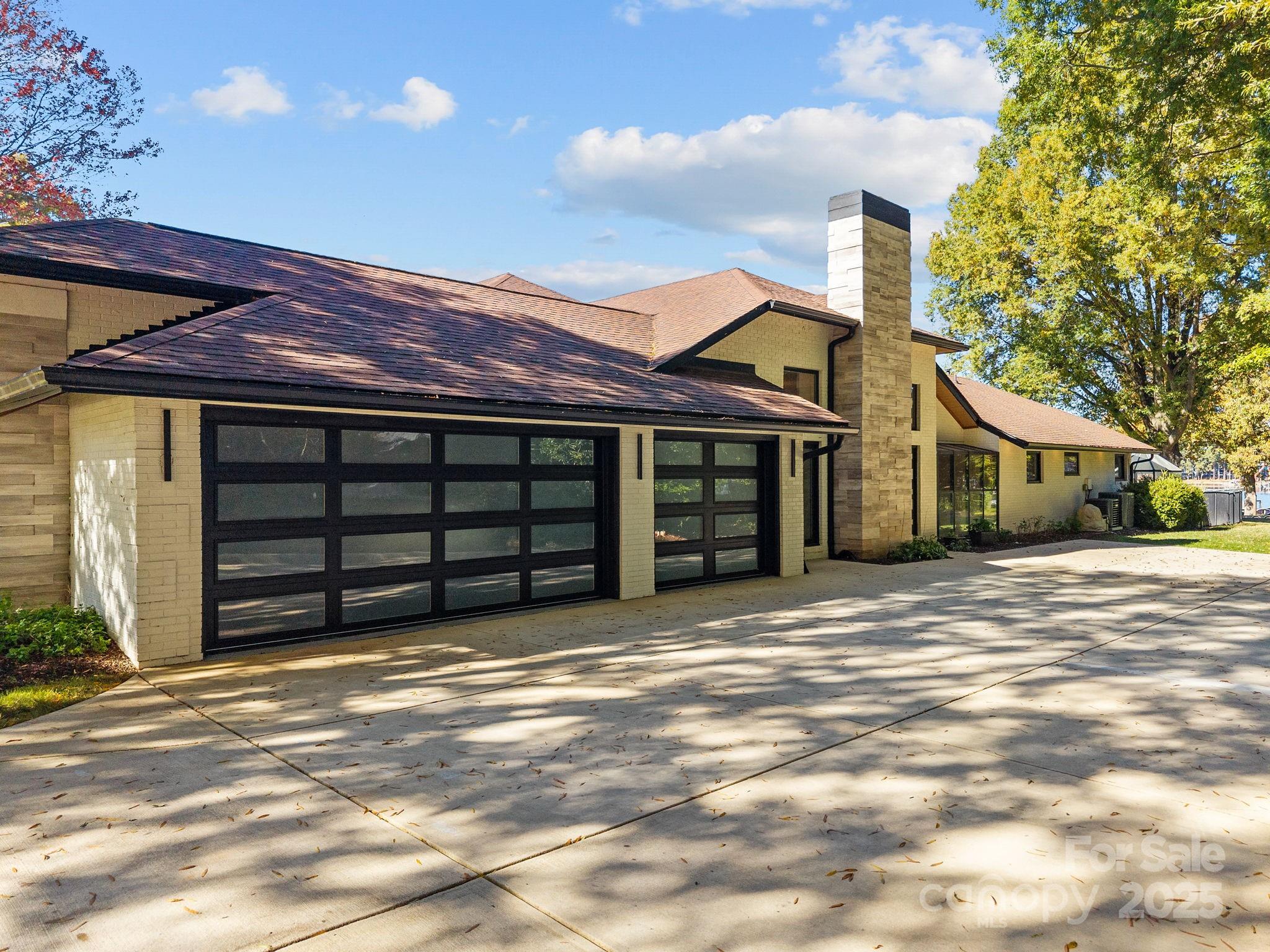 21400 Bethel Church Road Cornelius, NC 28031 - Photo 40 of 47 a view of a house with a garage