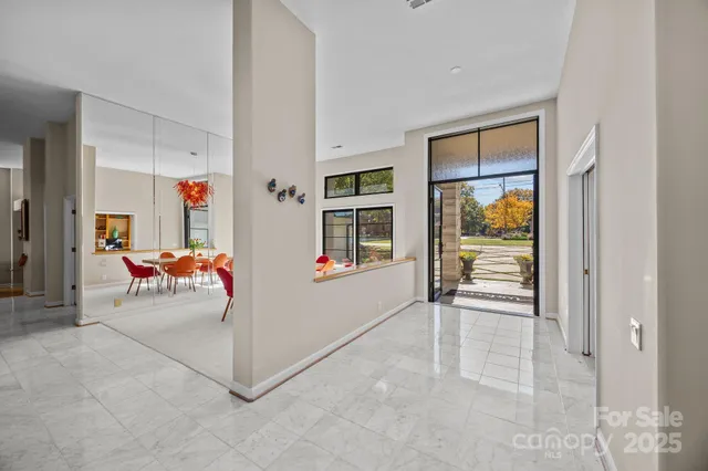 a view of an entryway with livingroom