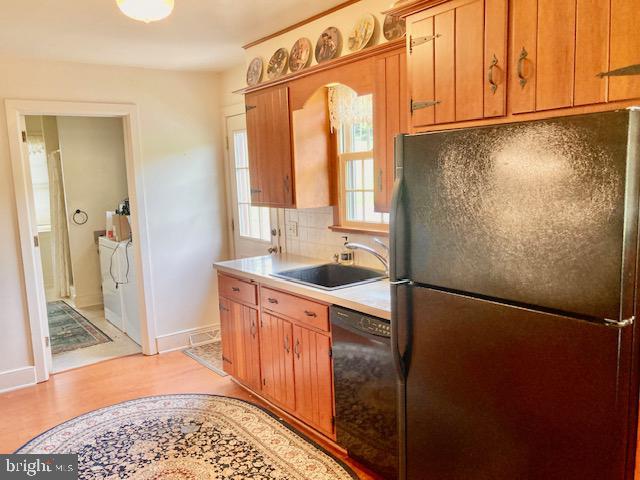 227 Lowry Road New Holland, PA 17557 - Photo 13 of 21 a kitchen with stainless steel appliances granite countertop a refrigerator a sink and a cabinets