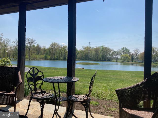 227 Lowry Road New Holland, PA 17557 - Photo 7 of 21 a view of a chairs and table in patio