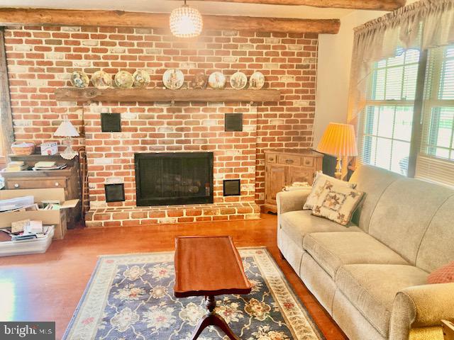 227 Lowry Road New Holland, PA 17557 - Photo 9 of 21 a living room with furniture and a fireplace