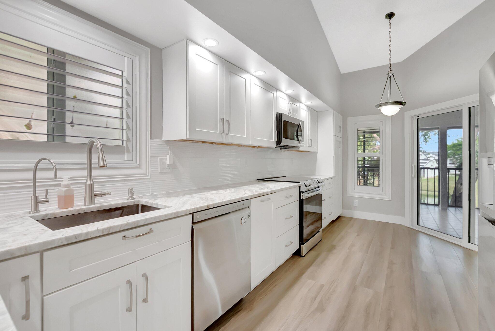 23228 Fountain View Drive, Unit B Boca Raton, FL 33433 - Photo 9 of 49 Fully Updated Kitchen