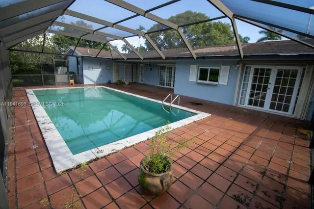 a view of a backyard with a patio