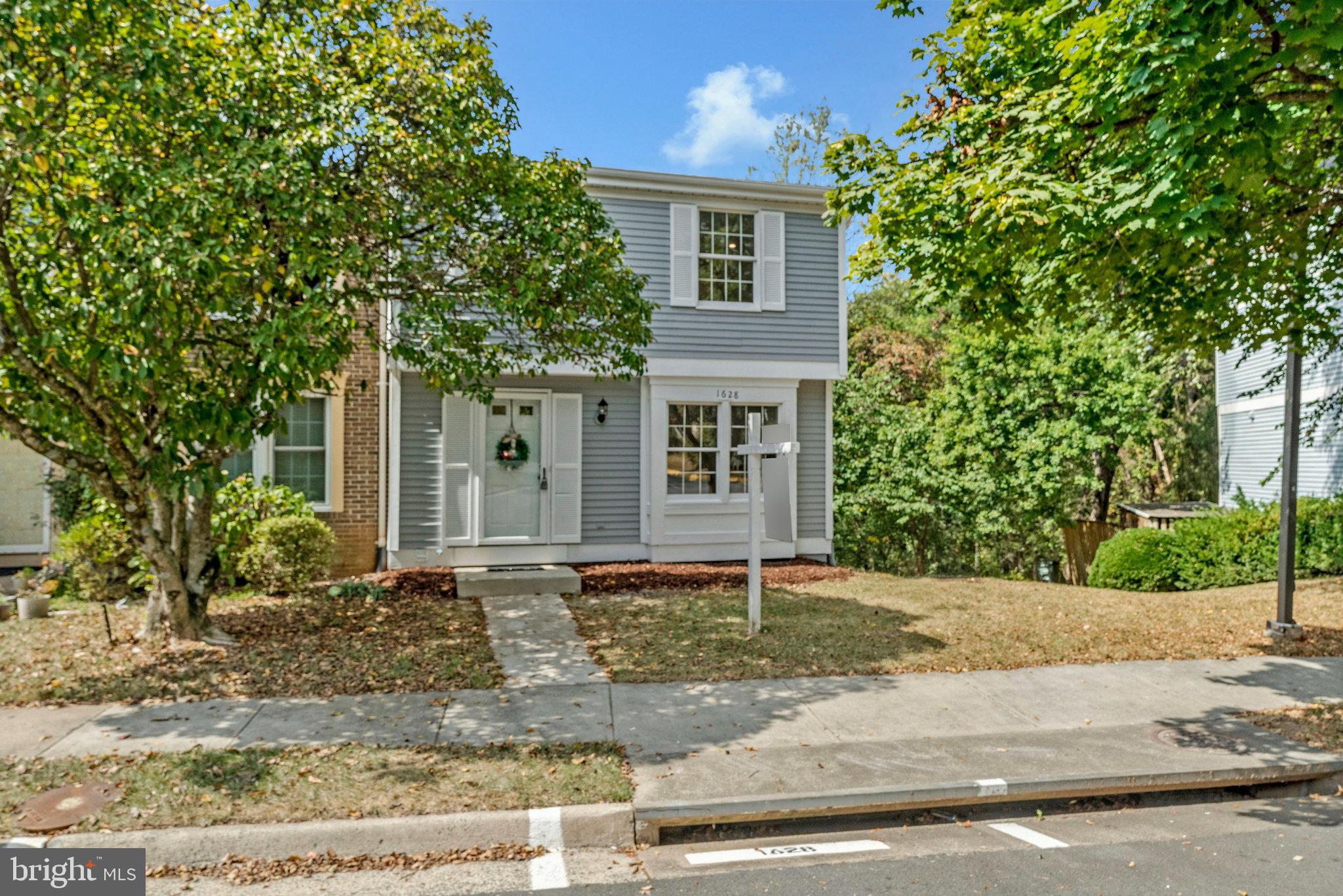 1628 Barnstead Drive Reston, VA 20194 - Photo 1 of 41 front view of a house with a yard