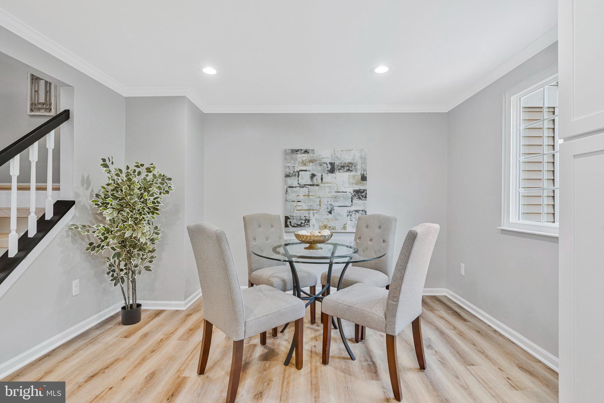1628 Barnstead Drive Reston, VA 20194 - Photo 12 of 41 a view of a dining room with furniture and wooden floor