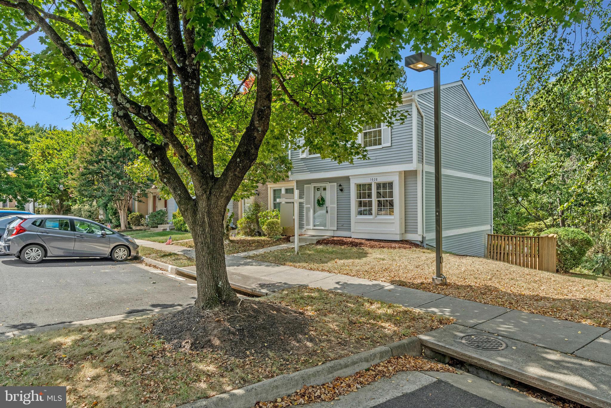 1628 Barnstead Drive Reston, VA 20194 - Photo 2 of 41 a view of a house with a tree in the background