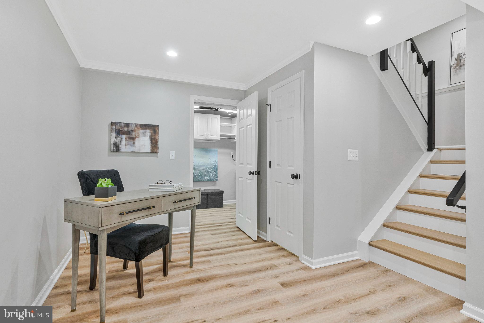 1628 Barnstead Drive Reston, VA 20194 - Photo 29 of 41 a view of a workspace with furniture and wooden floor