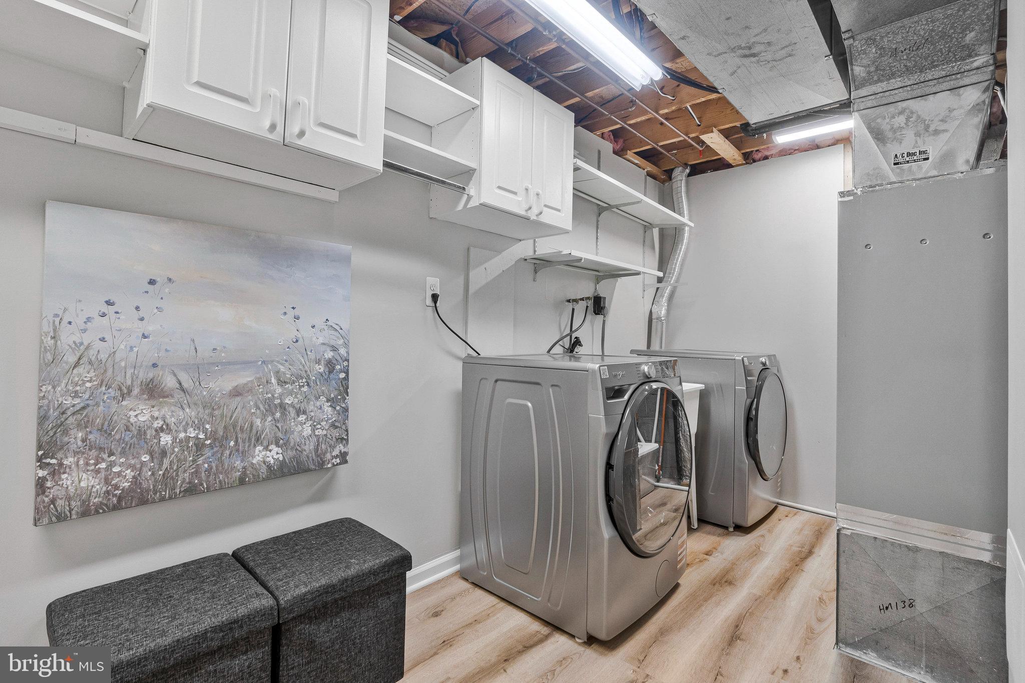 1628 Barnstead Drive Reston, VA 20194 - Photo 31 of 41 a utility room with dryer and washer