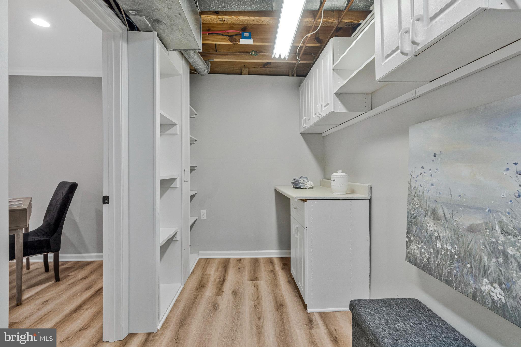 1628 Barnstead Drive Reston, VA 20194 - Photo 32 of 41 a view of small space with racks on the wall