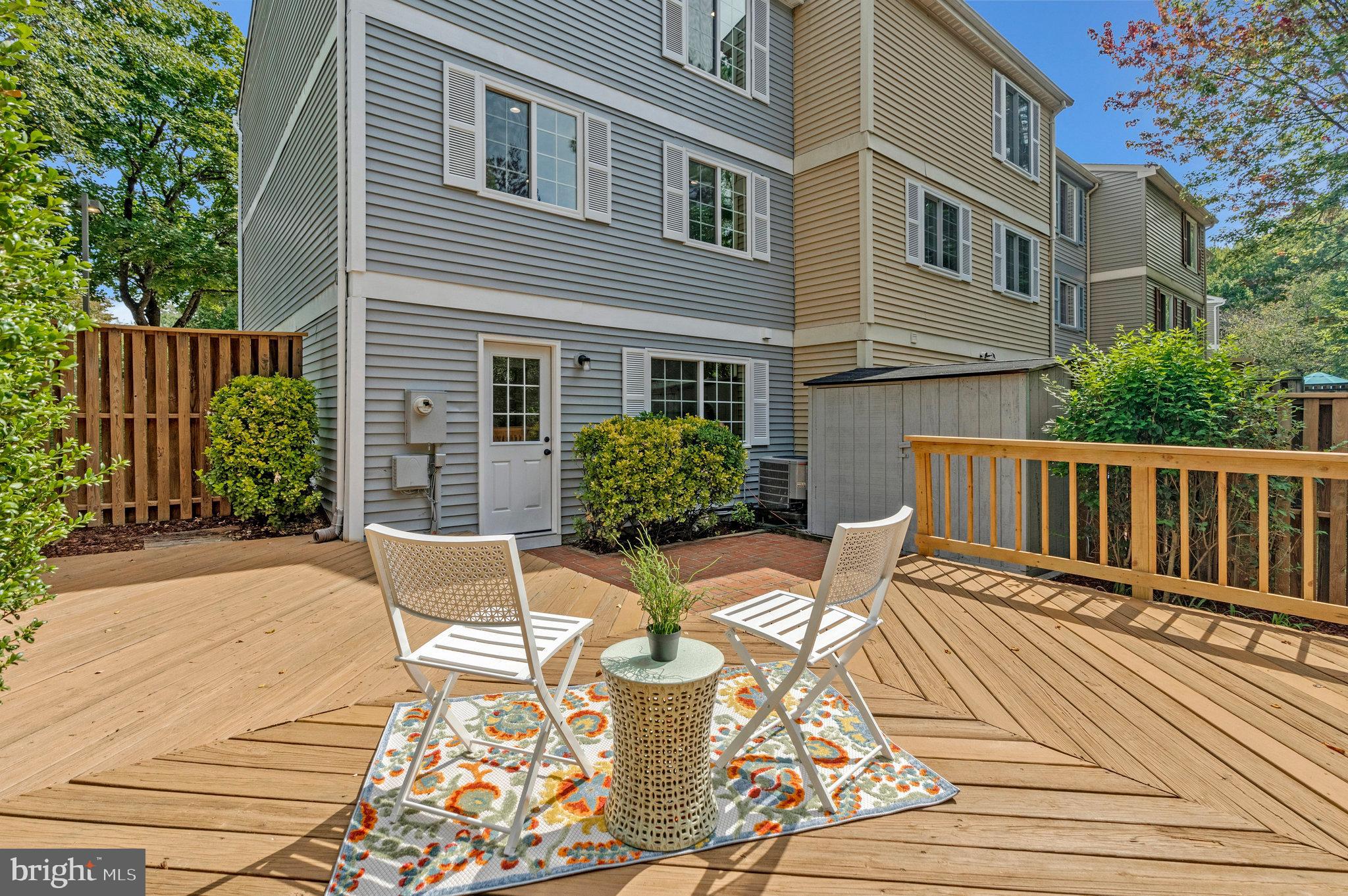 1628 Barnstead Drive Reston, VA 20194 - Photo 33 of 41 a view of a chairs and table on the terrace