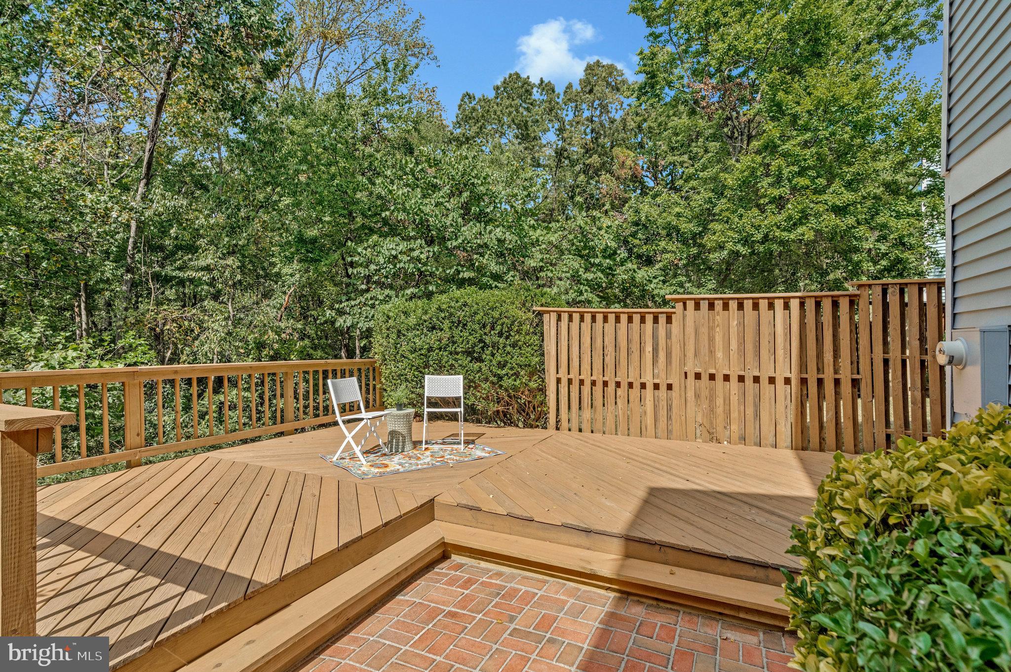 1628 Barnstead Drive Reston, VA 20194 - Photo 36 of 41 a view of balcony with wooden floor and outdoor seating