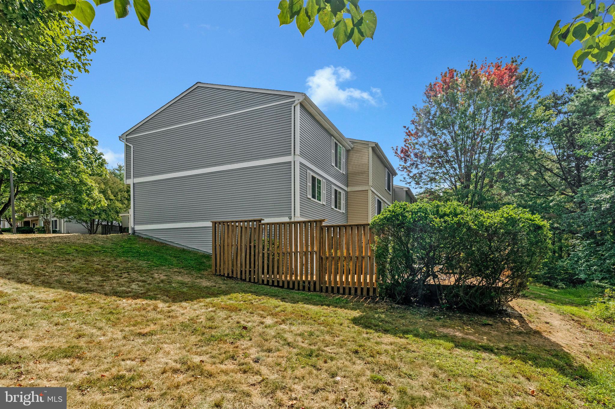 1628 Barnstead Drive Reston, VA 20194 - Photo 37 of 41 a view of backyard with garden and deck