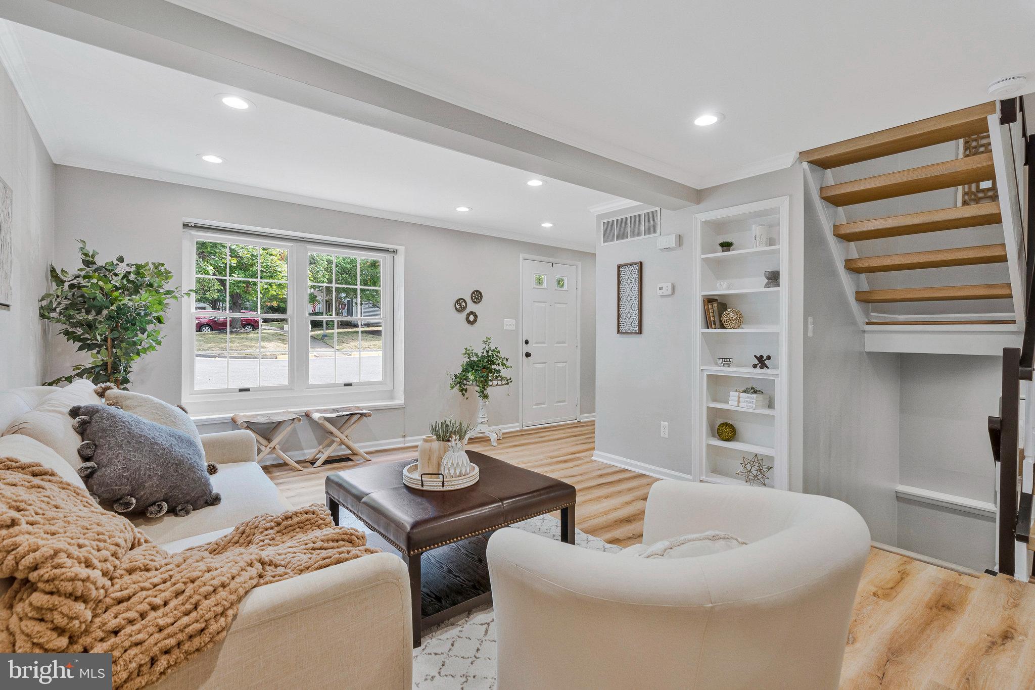1628 Barnstead Drive Reston, VA 20194 - Photo 5 of 41 a living room with furniture and a large window
