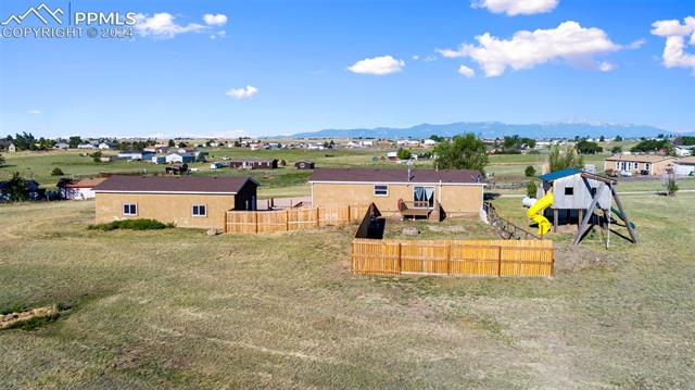 Back view of home showing full Pikes Peak View looking West