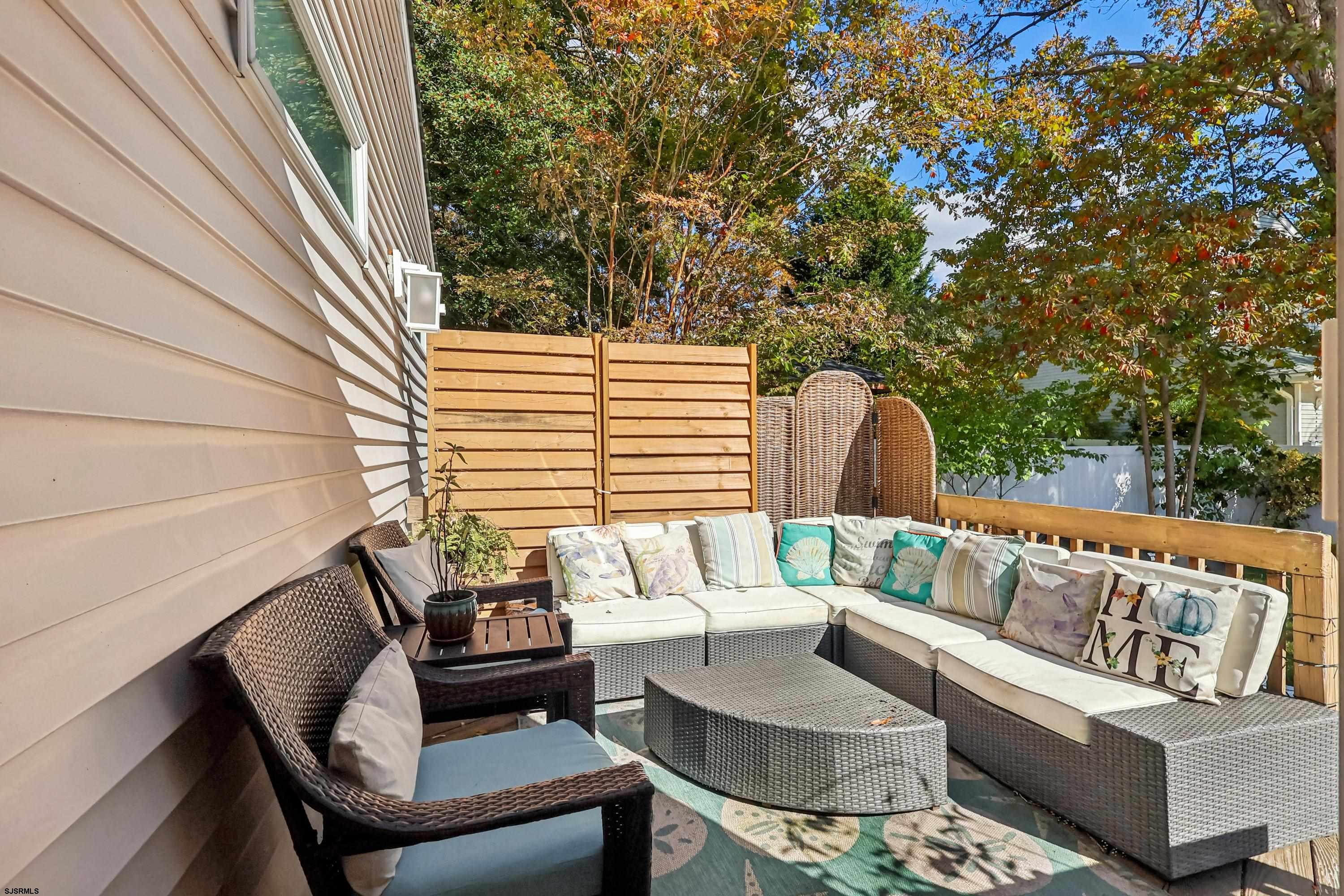 746 4th Street Somers Point, NJ 08244 - Photo 31 of 39 a view of sitting area with furniture and wooden floor